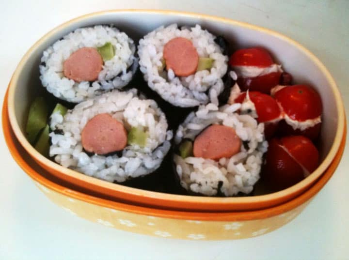 Hot dog sushi bento box.