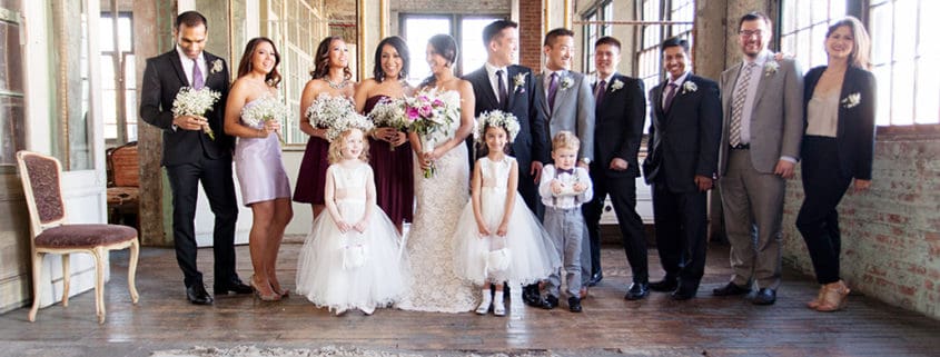 Wedding party group portrait on 3rd floor at Metropolitan Building in Long Island City, NY