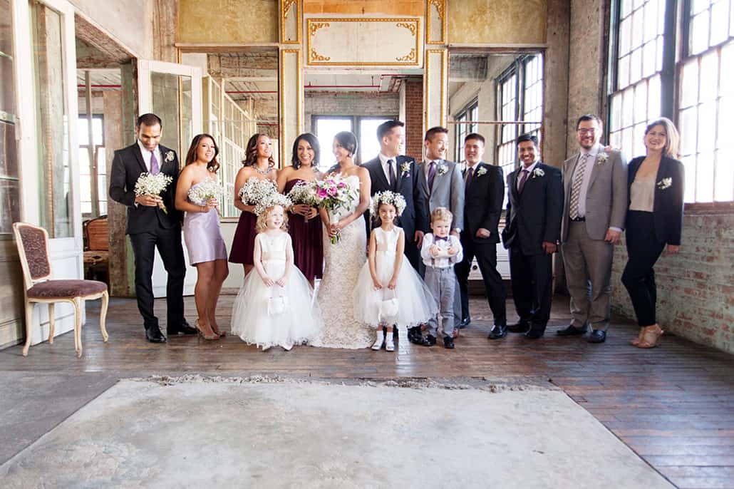 Wedding party group portrait on 3rd floor at Metropolitan Building in Long Island City, NY