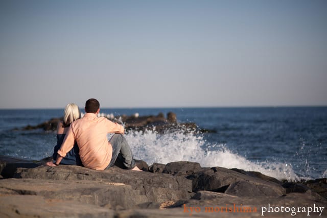 Watching the surf engagement portrait in Asbury Park by NJ wedding photographer Kyo Morishima