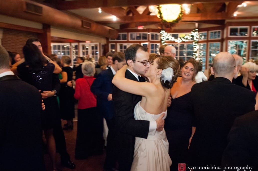 Winter Central Park NYC elopement Boathouse wedding reception bride and groom kiss