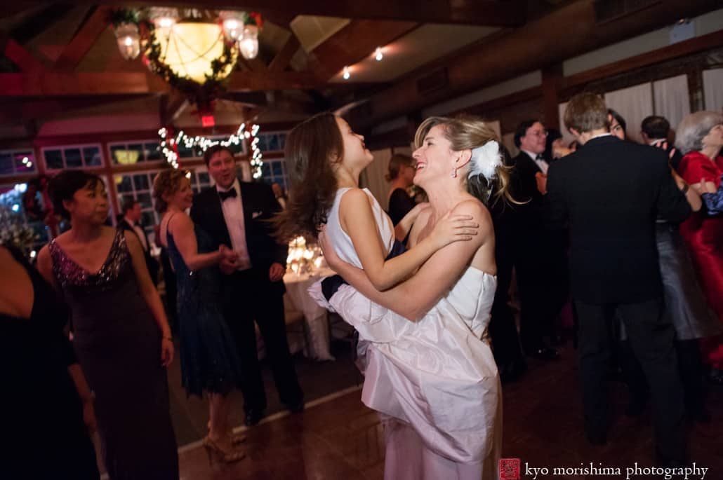 Winter Central Park NYC with snow outdoor portrait elopement Boathouse wedding reception bride and flower girl