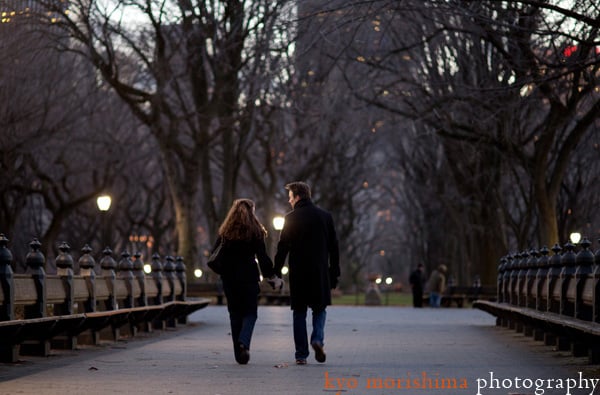 Couple walking in Central Park; engagement picture photographed by NYC wedding photographer Kyo Morishima
