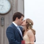 Hamptons bride and groom kiss, Quogue Beach Club, suit by Martin Greenberg, dress by Reem Acra, hair and makeup by Maysoon Faraj, photographed by Hamptons wedding photographer Kyo Morishima