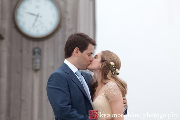 Hamptons bride and groom kiss, Quogue Beach Club, suit by Martin Greenberg, dress by Reem Acra, hair and makeup by Maysoon Faraj, photographed by Hamptons wedding photographer Kyo Morishima