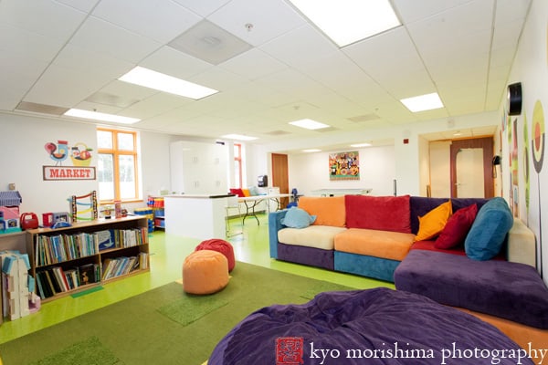 Renovated after-care room at a private school (Lovesac couch and beanbag, Armstrong Rave VCT floor tile, Flor "Made You Look" carpet tile, Ikea Abstrakt cabinetry), photographed by NJ documentary photographer Kyo Morishima.