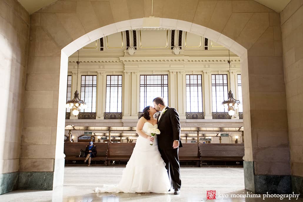Hoboken Terminal station bride and groom kiss archway