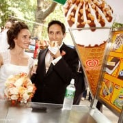 Bride and Groom eating hot dog in Central Park, NYC, photographed by Kyo Morishima