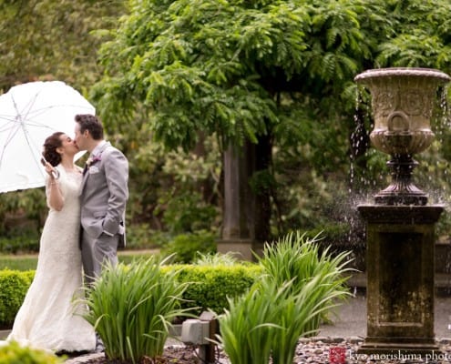 Van Vleck Gardens wedding picture in the rain, photographed by Montclair wedding photographer Kyo Morishima