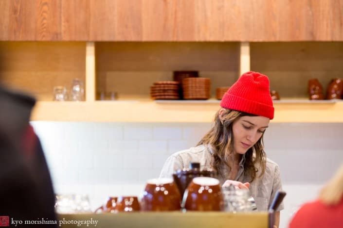 Barista with red hat at Blue Bottle Coffee in Williamsburg, photographed by Kyo Morishima