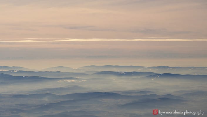 aerial photograph of clouds and mountains by kyo morishima