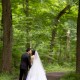 Wedding kiss under the trees, photographed by Tarrytown wedding photographer Kyo Morishima