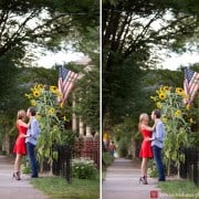 Woman in a red dress kisses her fiancé next to sunflowers and an American flag, photographed by Lambertville engagement photographer Kyo Morishima