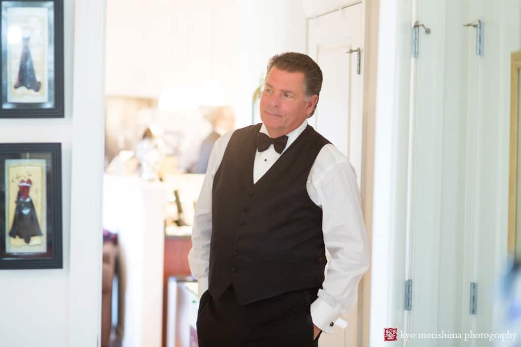 Father of the bride watches his daughter getting ready at Westin Forrestal Village, photographed by Princeton wedding photographer Kyo Morishima
