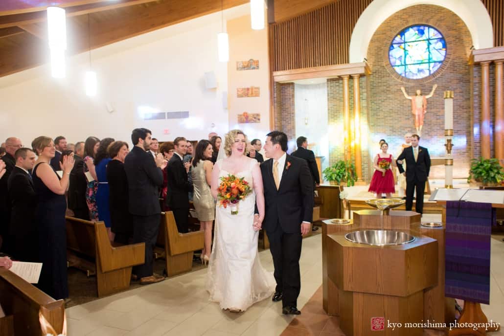 Bride and groom depart wedding ceremony at Queenship of Mary Church in Plainsboro, photographed by Kyo Morishima