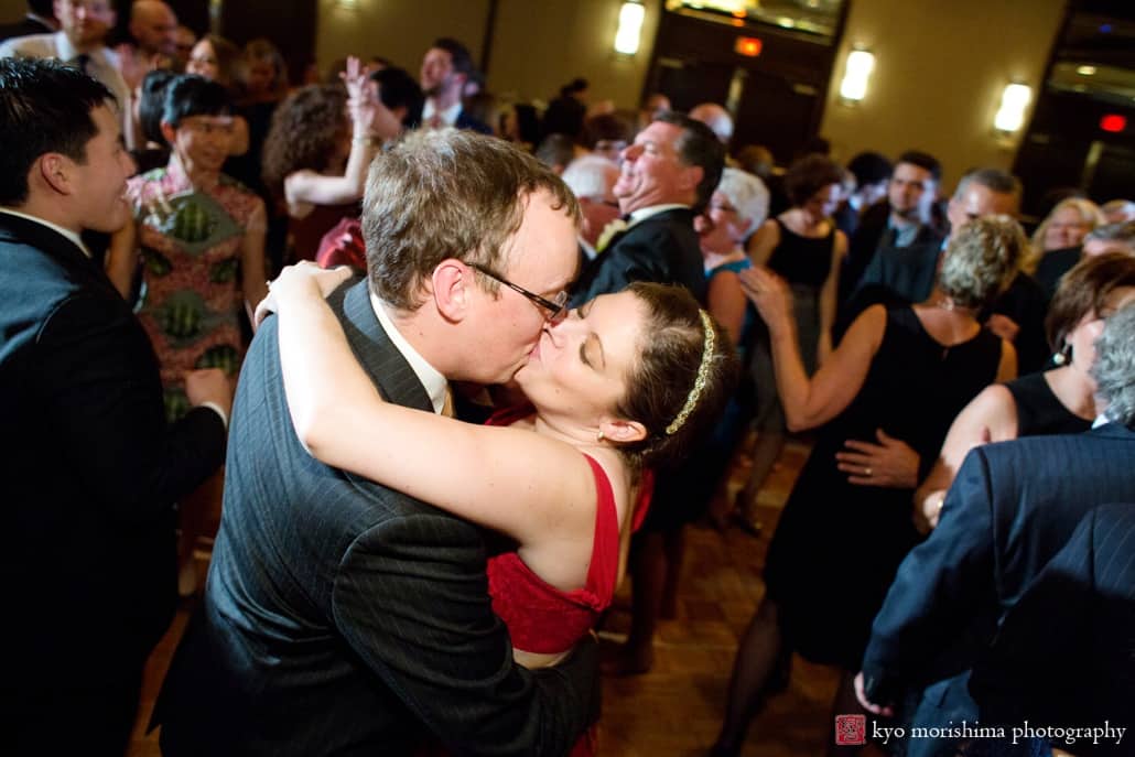 Passionate kiss on the dance floor at Westin Forrestal Village wedding, photographed by Kyo Morishima