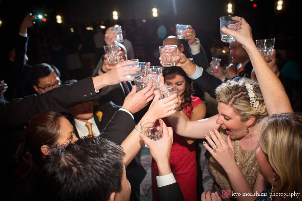 Bride toasts with friends at Westin Forrestal Village wedding, photographed by Kyo Morishima