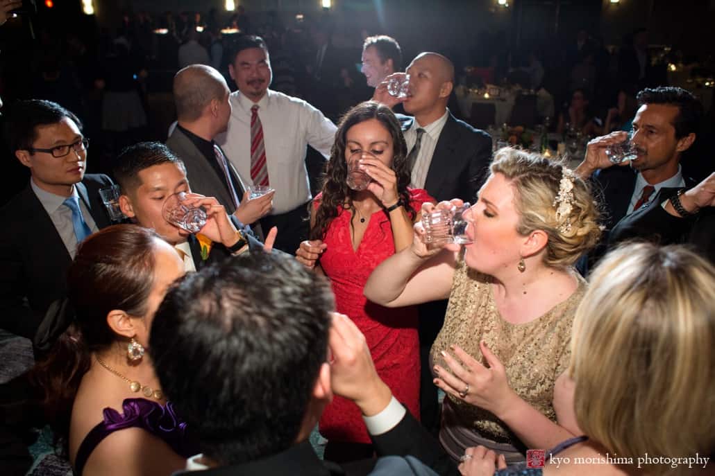 Bride drinks shots with wedding guests at Westin Forrestal Village in Princeton, photographed by Kyo Morishima