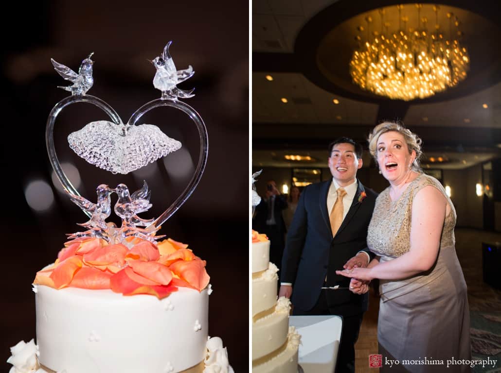 Bride and groom get ready to cut the cake at Westin Princeton wedding, photographed by Kyo Morishima