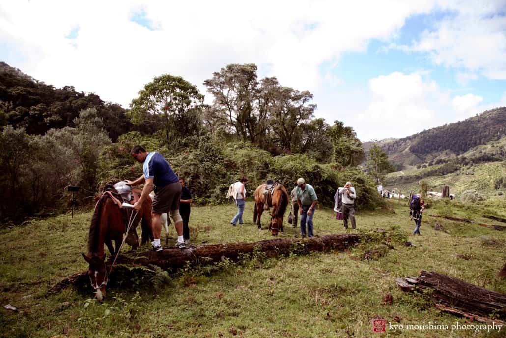 Saddling horses for trek up a mountainside in central Costa Rica, photographed by Kyo Morishima