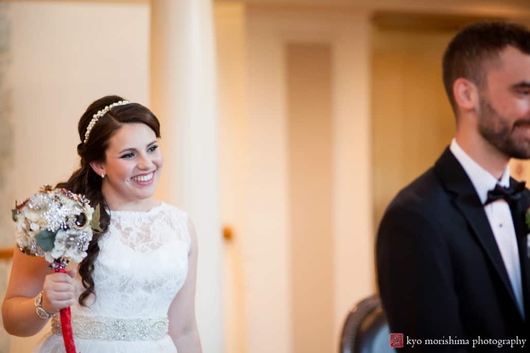 Bride smiles as she approaches groom for first look at Olde Mill Inn, photographed by NJ wedding photographer Kyo Morishima