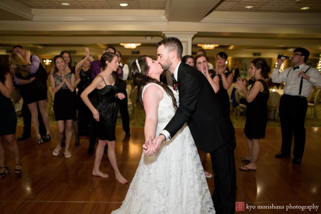 Bride and groom kiss on the dance floor at Olde Mill Inn wedding photographed by Kyo Morishima