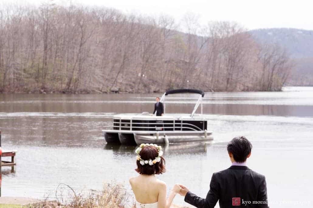 Bride and groom await boat ride on Candlewood Lake, photographed by Kyo Morishima