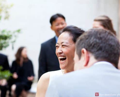 Bride laughs during Invisible Dog wedding ceremony, photographed by Boerum HIll wedding photographer Kyo Morishima