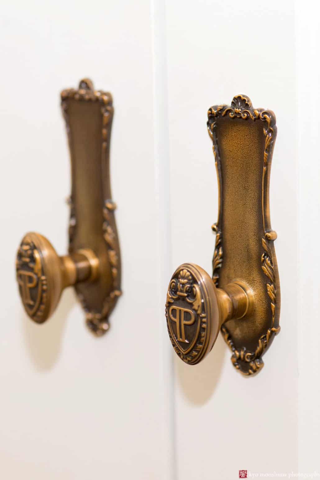 Doorknobs outside Plaza Hotel guest room, photographed by Kyo Morishima