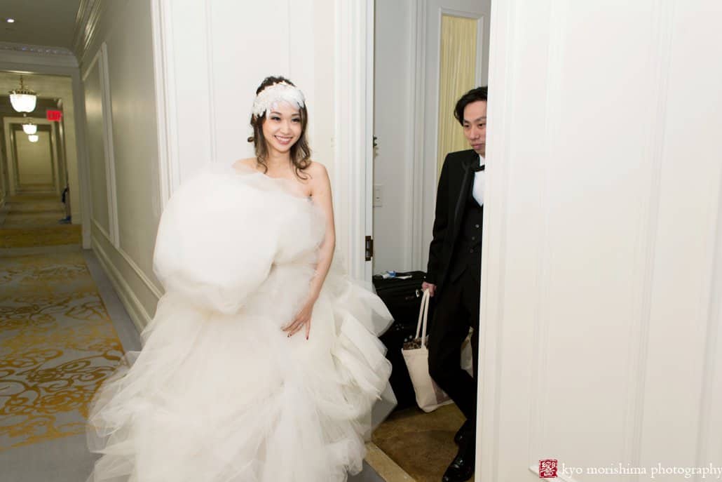 Bride and groom emerge from their room at the Plaza Hotel for their Japanese wedding photo tour, photographed by Japanese wedding photographer Kyo Morishima