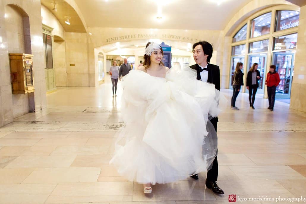 Documentary portrait of Japanese bride and groom at Grand Central Station, photographed by Kyo Morishima