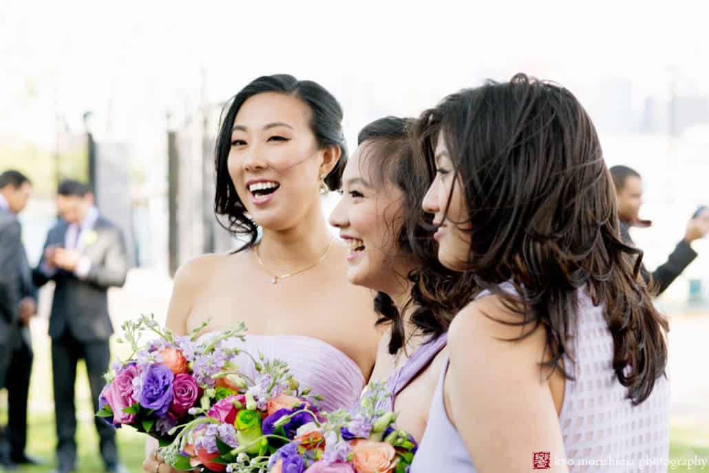 Bridesmaids watch wedding portrait session at Weehawken Waterfront Park, photographed by Kyo Morishima