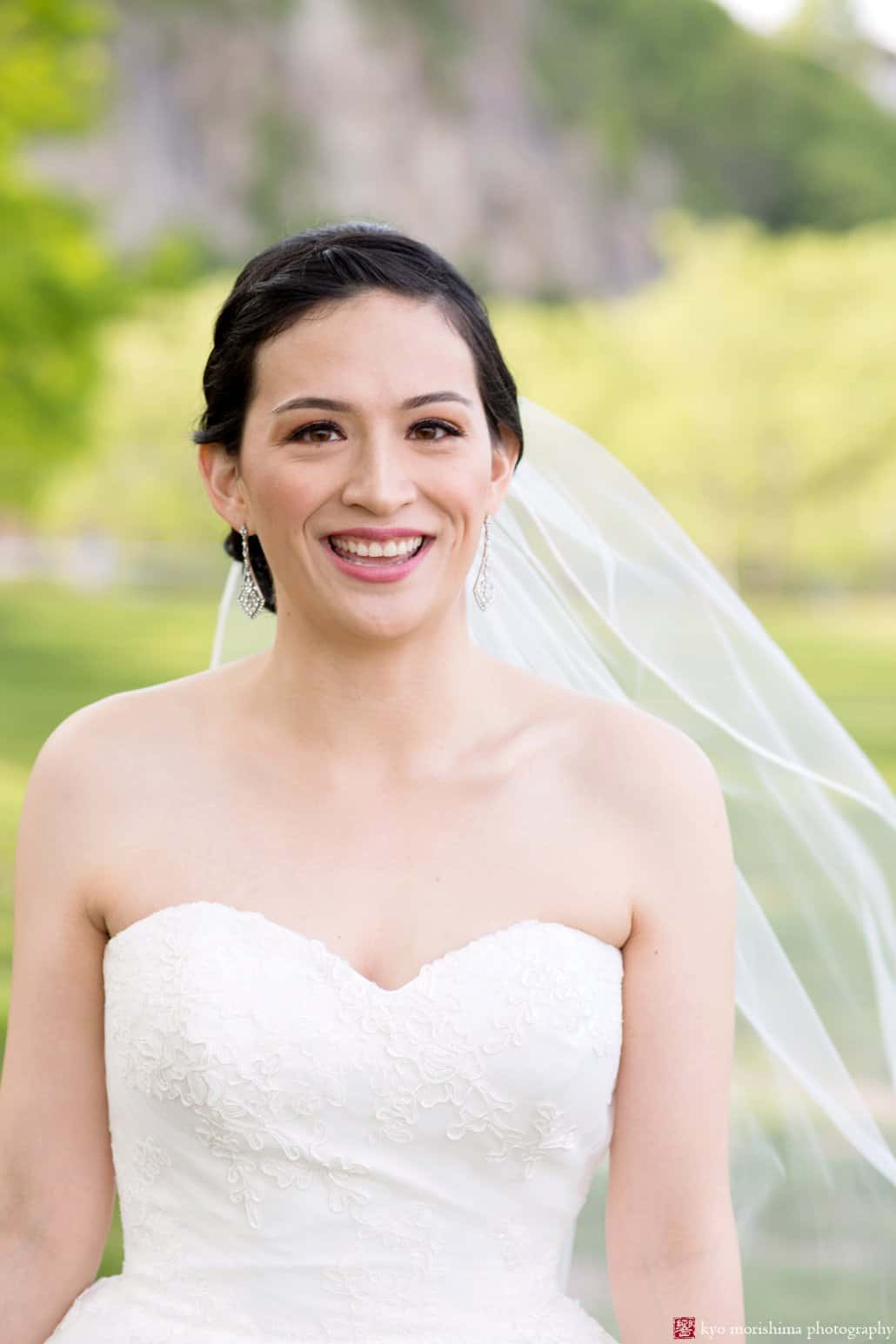 Bride smiles for portrait in Weehawken Waterfront Park, photographed by Kyo Morishima