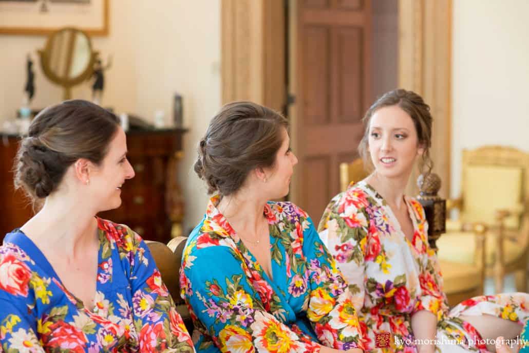 Bridesmaids wearing flower robes talk and laugh as they get ready for Jasna Polana wedding, photographed by Kyo Morishima
