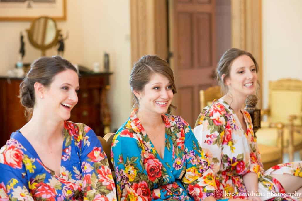 Bridesmaids wearing flower robes talk and laugh as they get ready for Jasna Polana wedding, photographed by Kyo Morishima