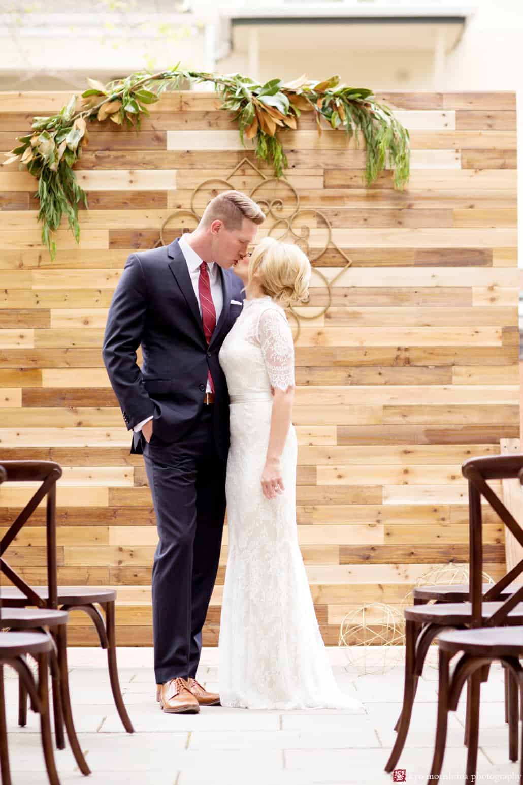 Bride and groom on the patio at Nassau Inn 