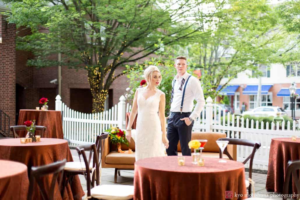 Bride and groom on patio of Nassau Inn in Princeton during 1960s 