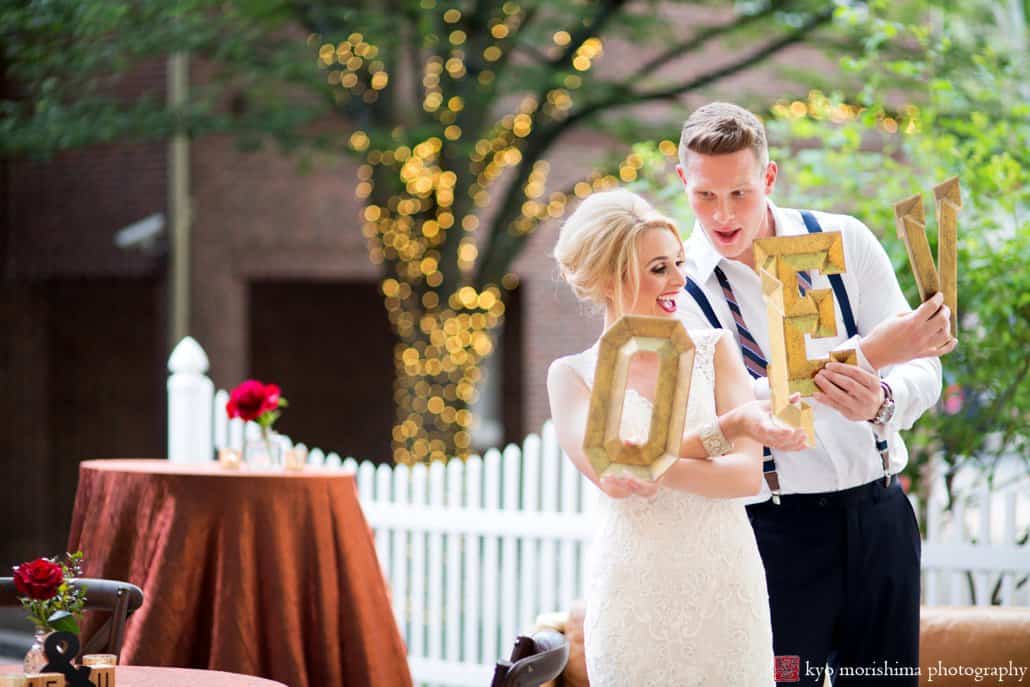 Bride and groom holding 