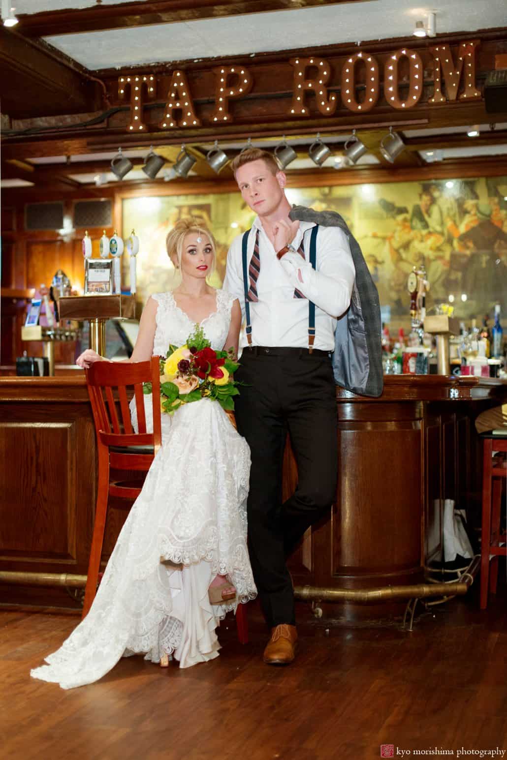 Bride and groom in Nassau Inn's Yankee Doodle Tap Room during 