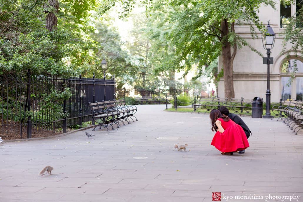 A squirrel approaches a couple in a NYC square near City Hall, photographed by Kyo Morishima
