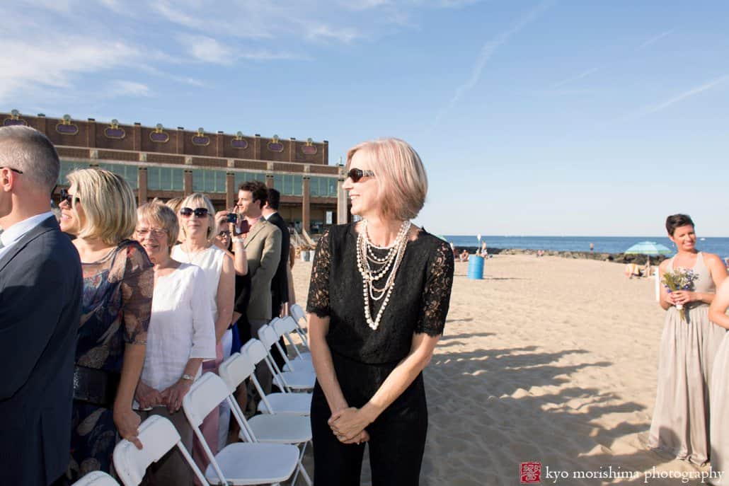 Mother watches bride approaching during Asbury Park wedding ceremony, photographed by Kyo Morishima