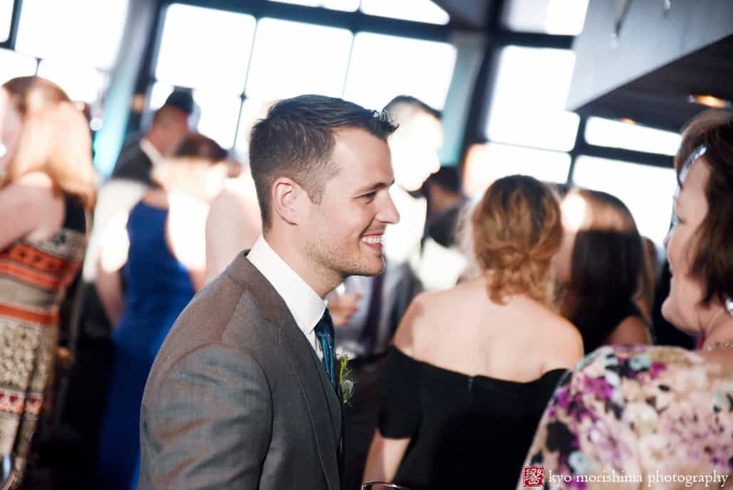 Groom smiles during Tim McLoone's Supper Club wedding reception in Asbury Park, photographed by Kyo Morishima