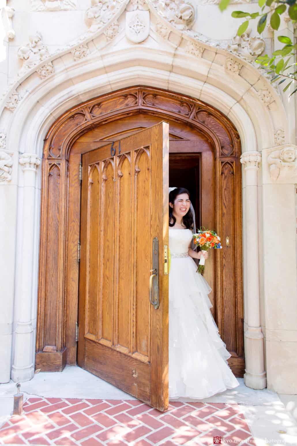 Bride opens door at Princeton Cap and Gown Club and makes a funny face, photographed by Kyo Morishima