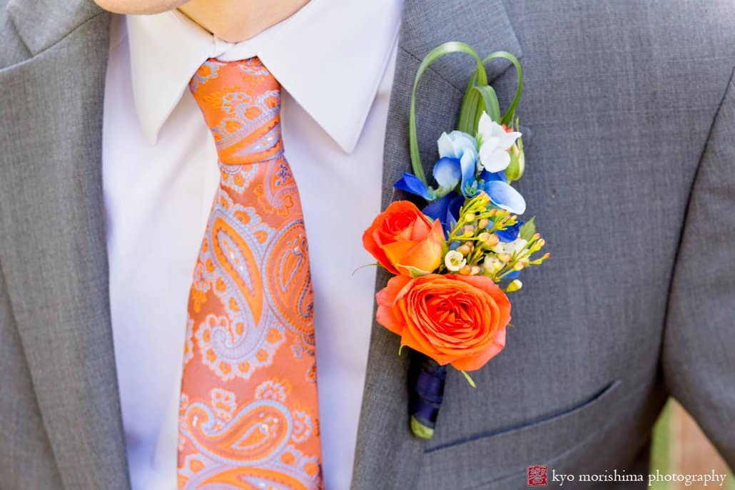 Colorful orange and blue Whole Foods wedding boutonniere photographed by Kyo Morishima