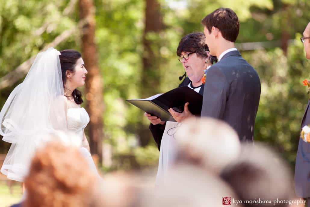 Bride and groom exchange vows during outdoor ceremony photographed by Princeton wedding photographer Kyo Morishima