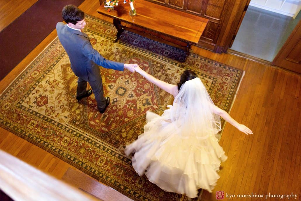 Bride and groom practice their dance in the foyer before Princeton Cap and Gown Club wedding reception begins, photographed by Kyo Morishima