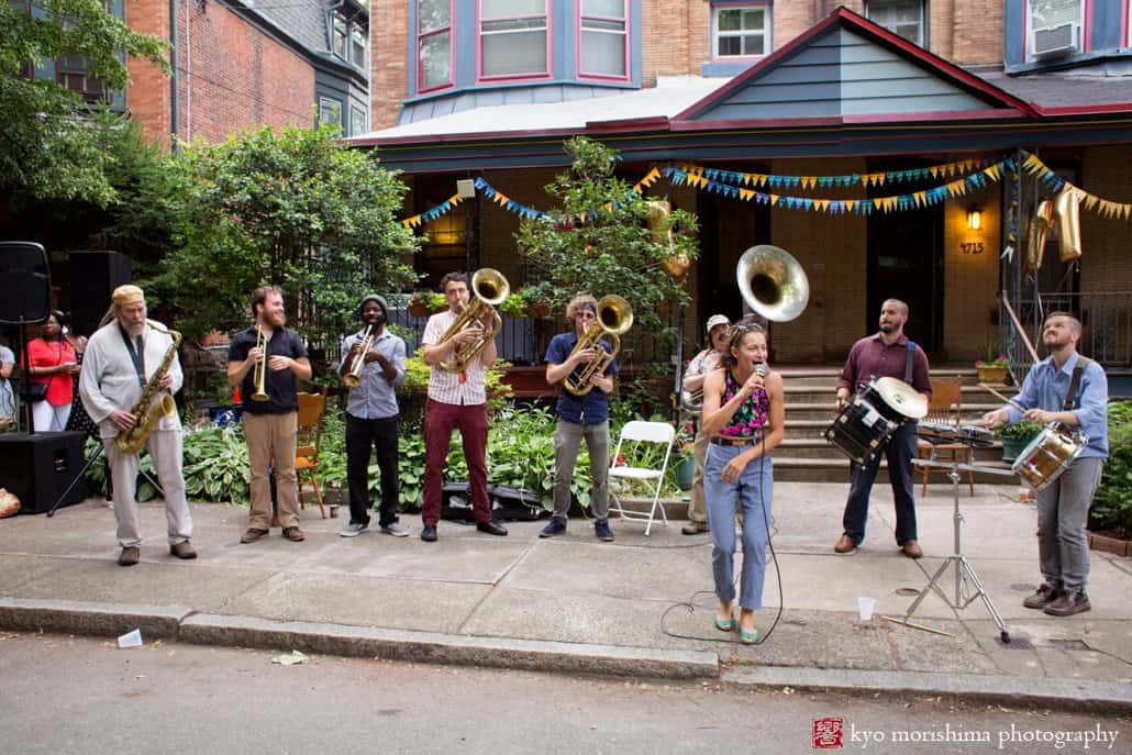 The West Philadelphia Orchestra plays on the 4700 block of West Windsor Ave in Philly during block party wedding in July, photographed by Kyo Morishima