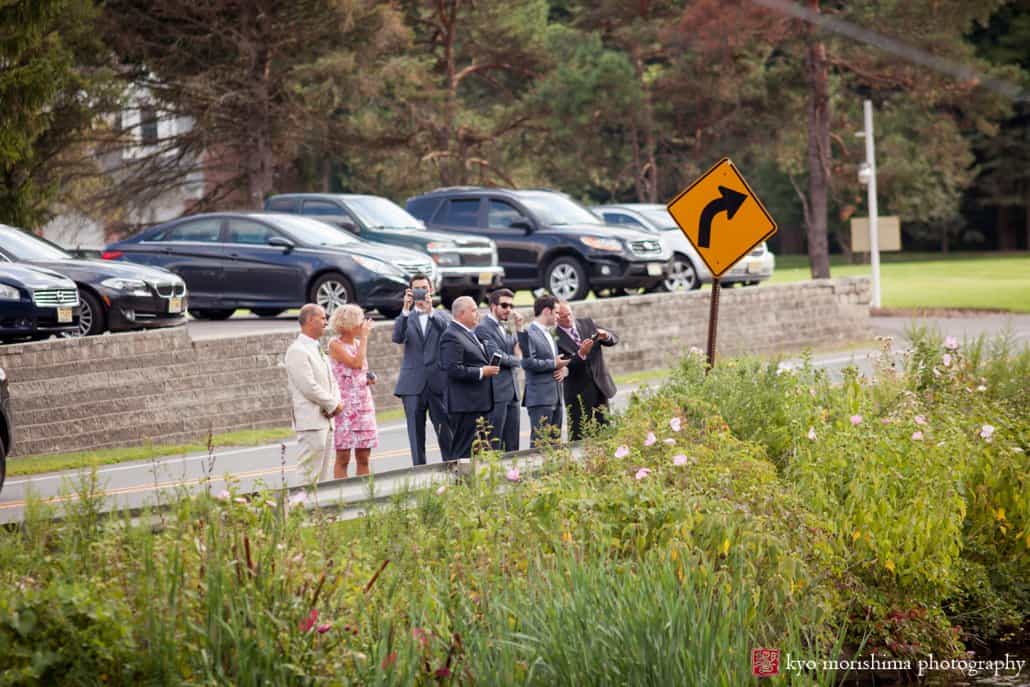 Parents and guests watch first look photography at Perona Farms wedding photographed by Kyo Morishima
