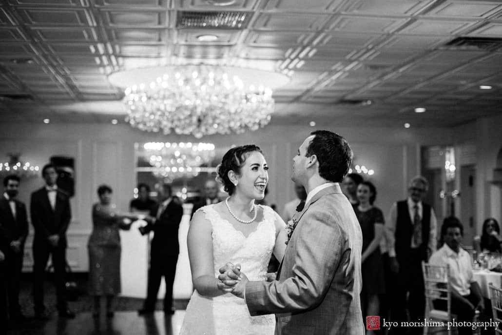 Bride laughs during first dance in Perona Farms ballroom photographed by Kyo Morishima