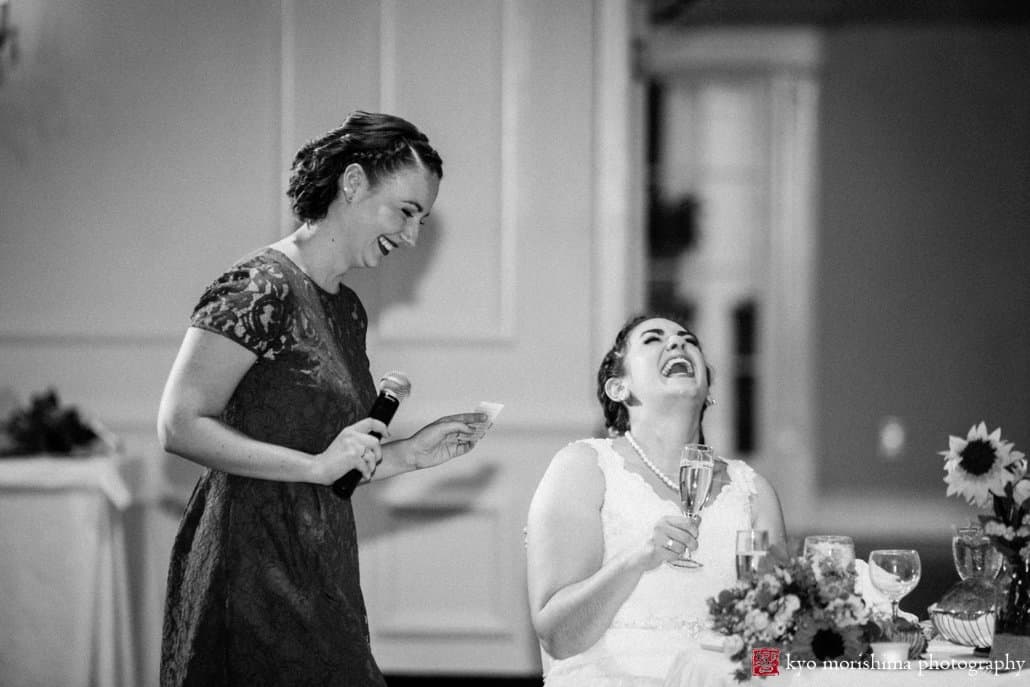 Bride laughs during toast at Perona Farms wedding photographed by Kyo Morishima